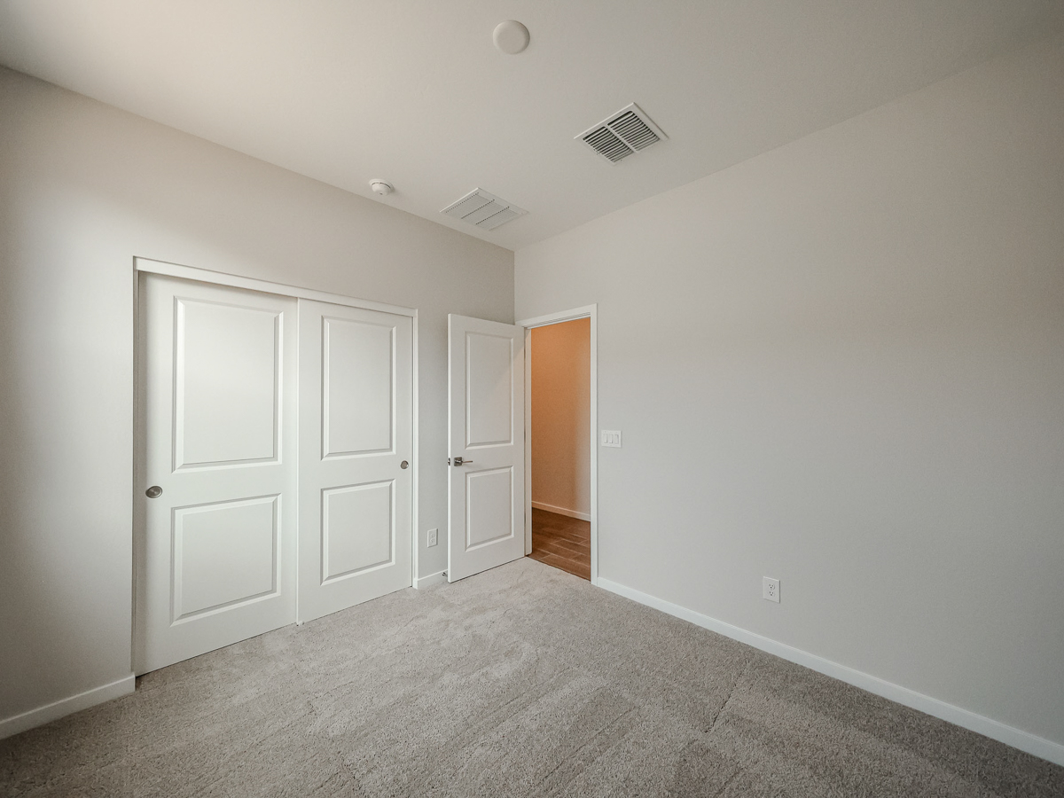 A room with white doors.