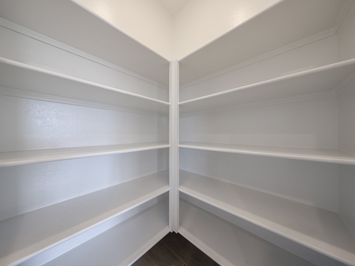 A white shelf with white shelves.