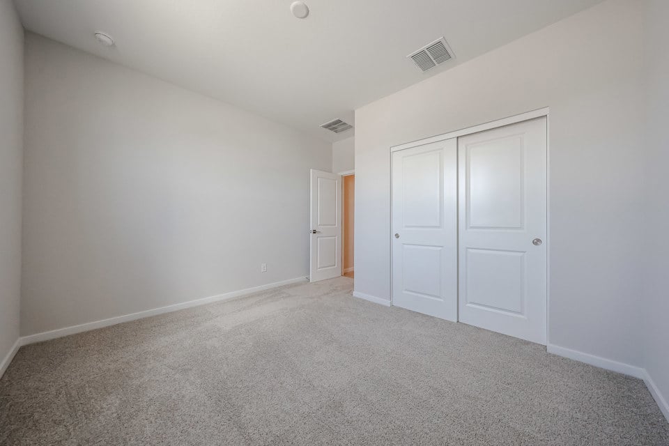 A room with white doors.