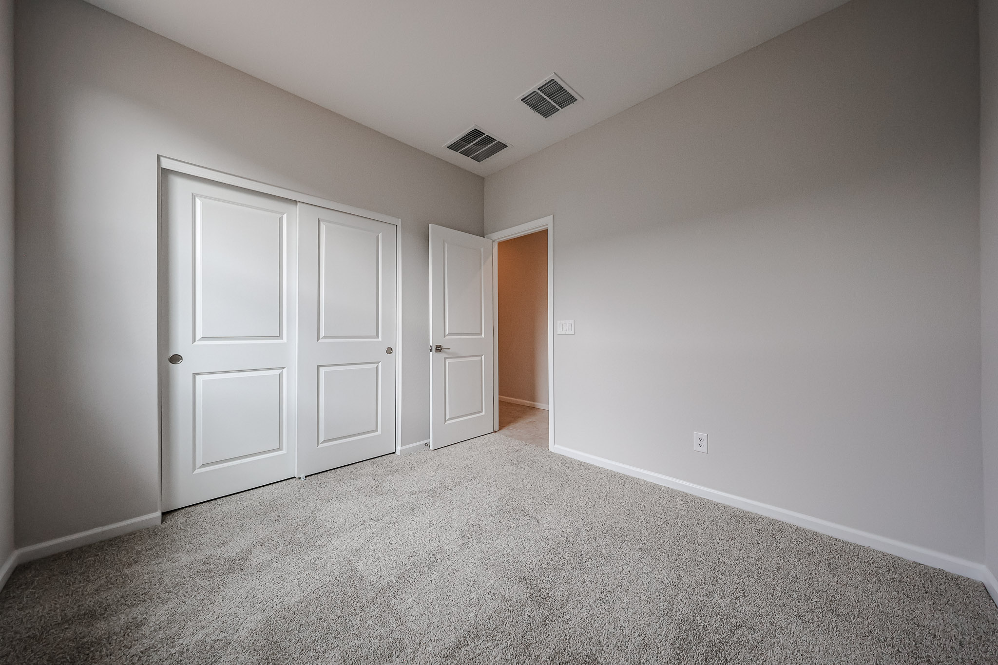 A room with white doors.