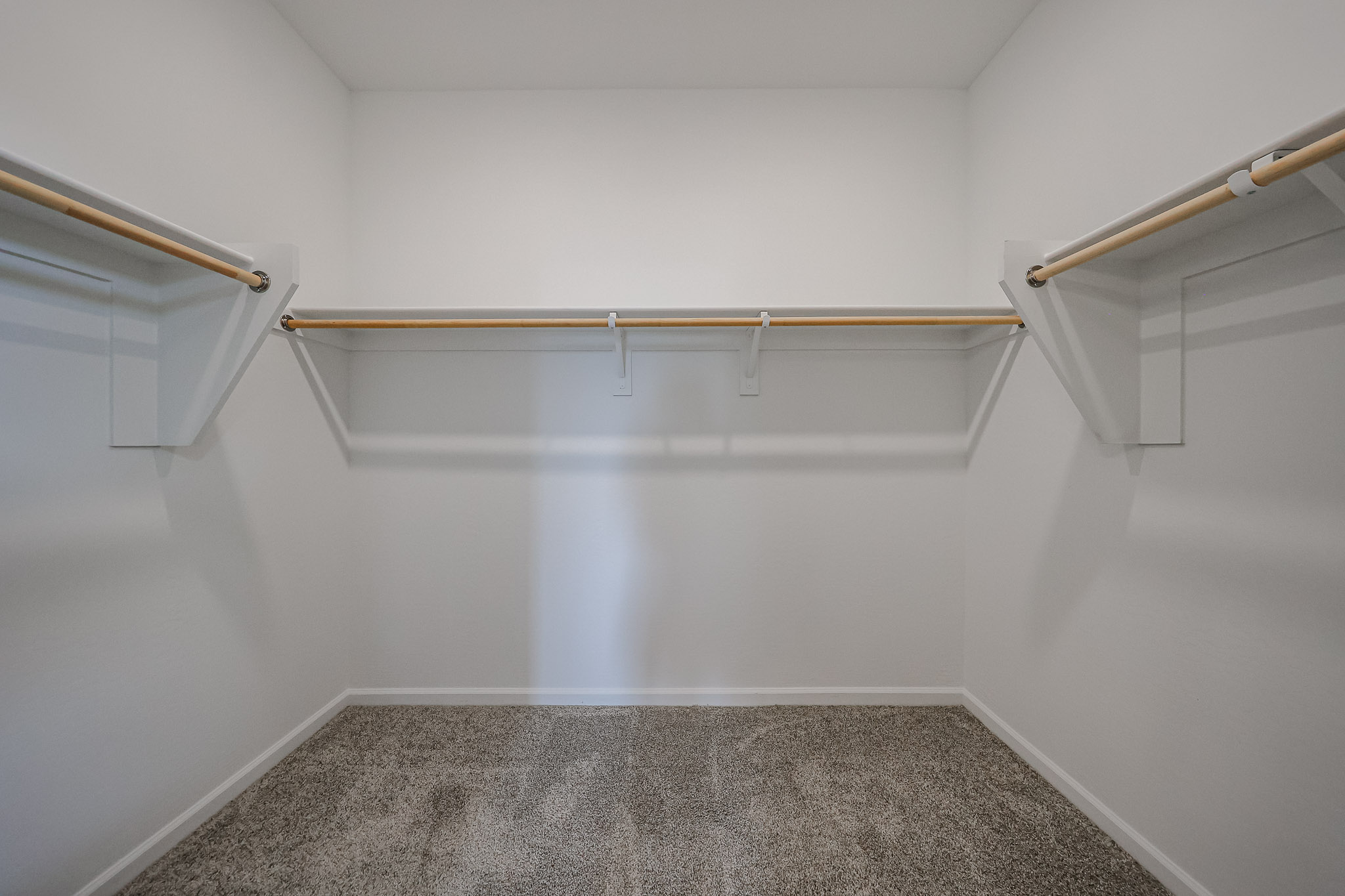 A room with a few metal bars.