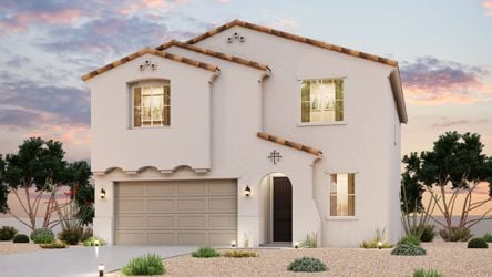 A white house with a garage.