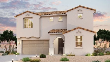 A white house with a garage.