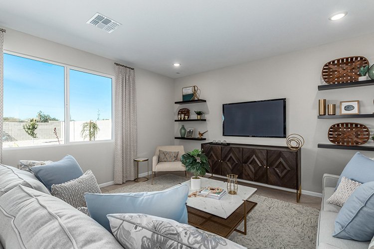 A living room with a tv and a couch.