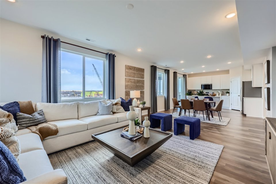 A living room with a large window.