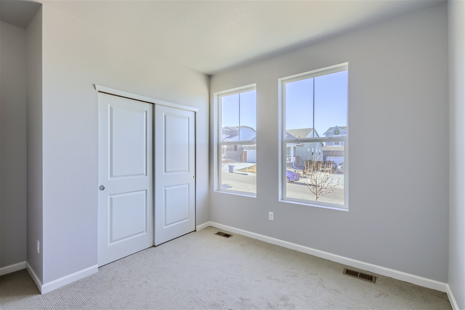 A room with white doors.