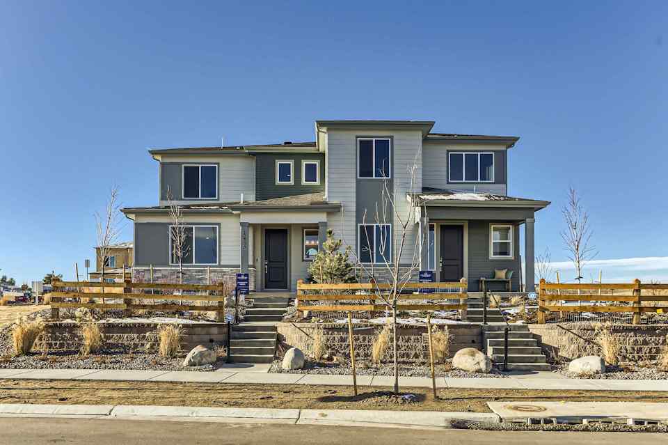 A house with a fence around it.