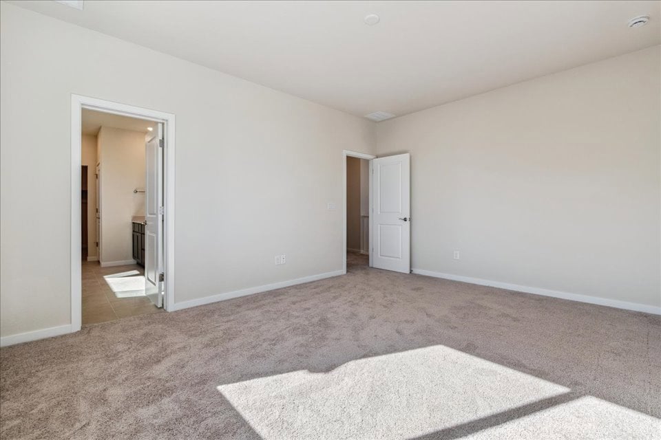 A room with a rug and a rug.