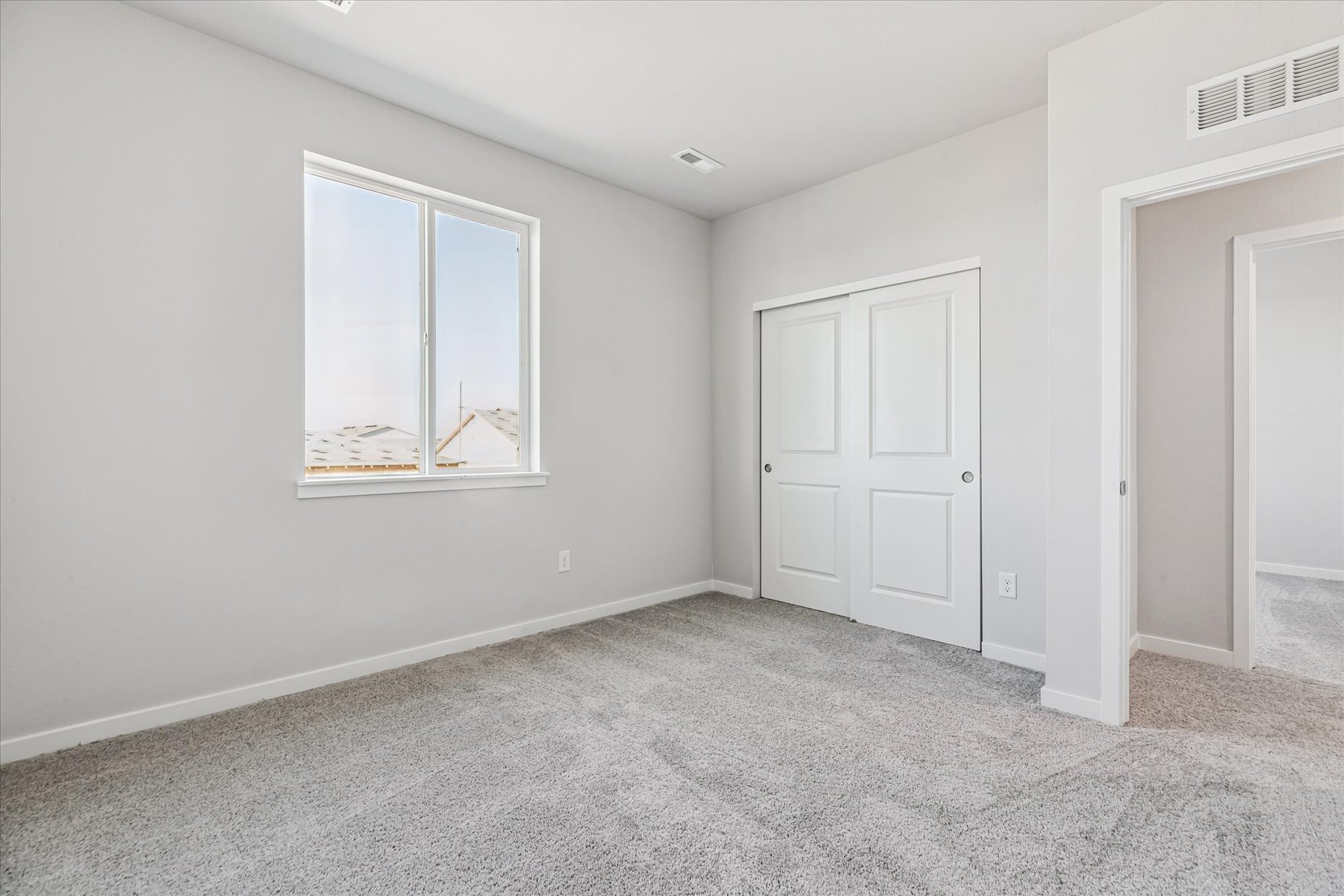 A room with white doors.