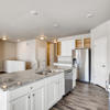 kitchen island of the ranch style Palisade plan by Century Communities