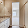 Primary dual vanity and shower of the ranch style Palisade plan by Century Communities