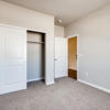 Secondary bedroom with walk in closet of the ranch style Palisade plan by Century Communities