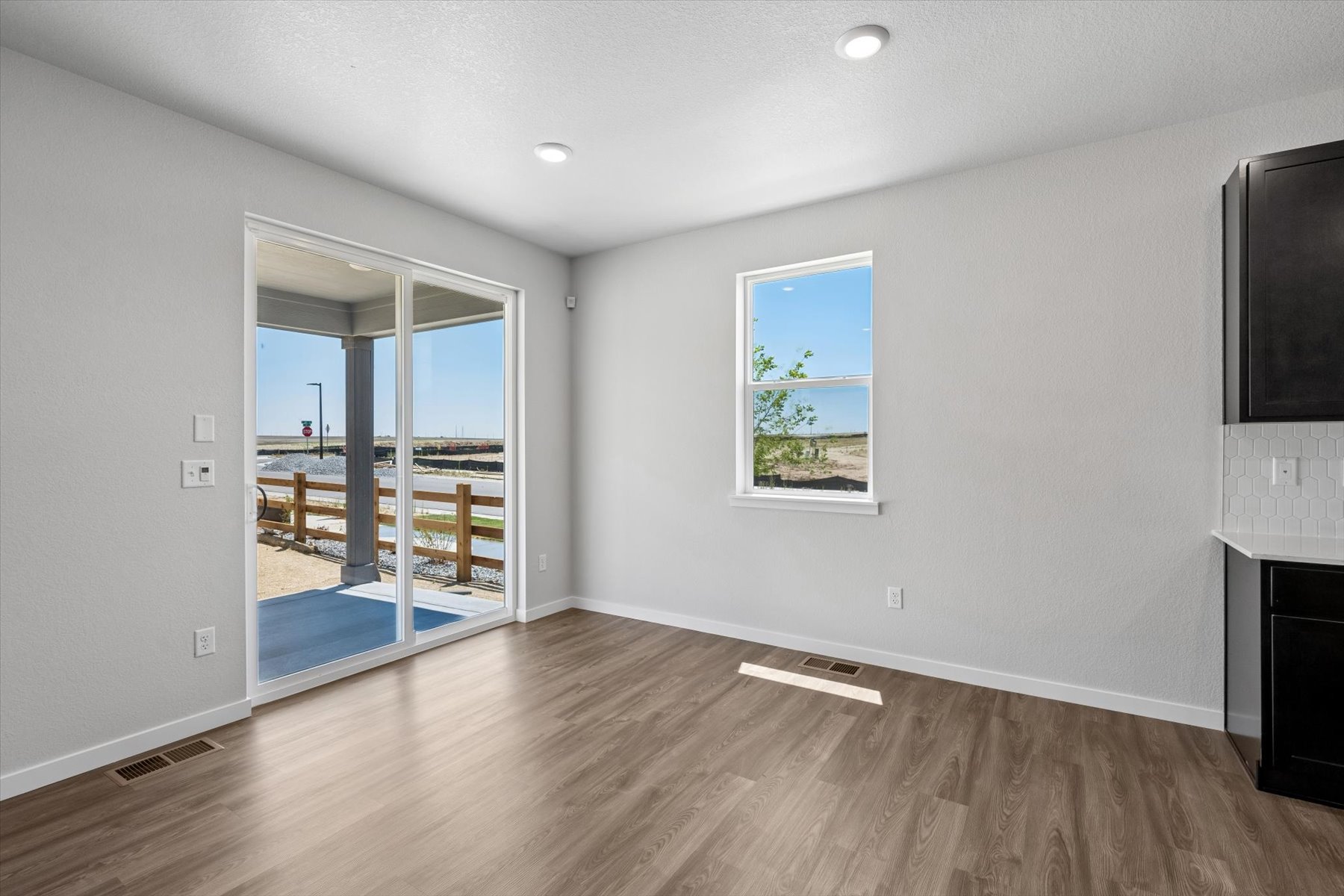 A room with a glass door.
