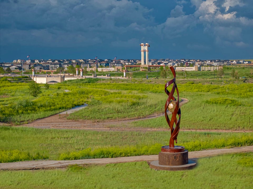 A statue in a field.