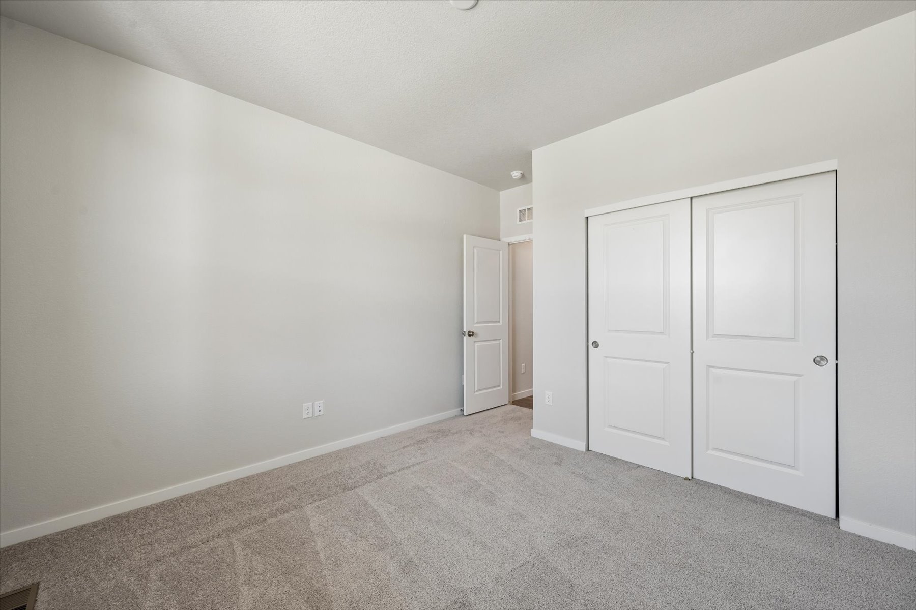 A room with white doors.