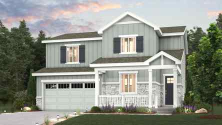 A large house with a lawn in front of it.