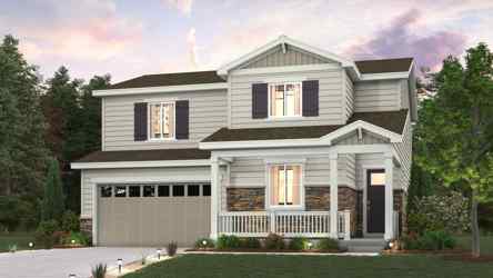 A large house with a lawn in front of it.