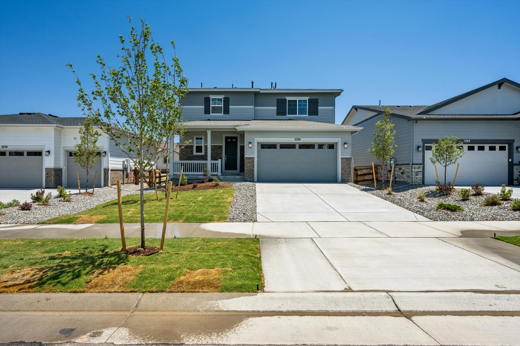 A driveway leading to a house.