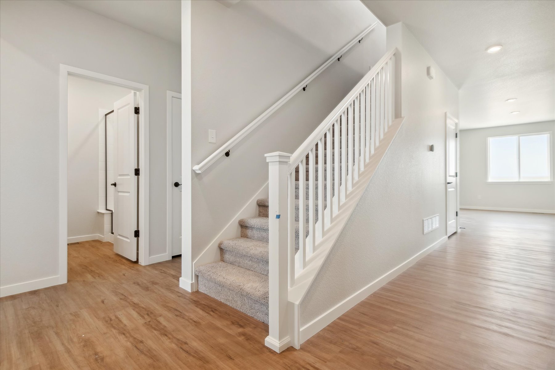A white staircase in a house.