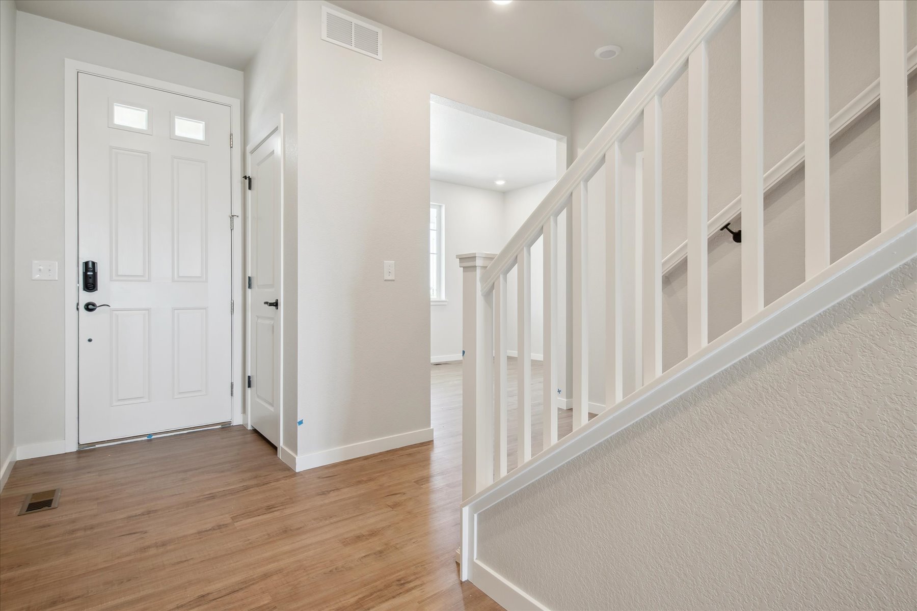 A white staircase in a house.