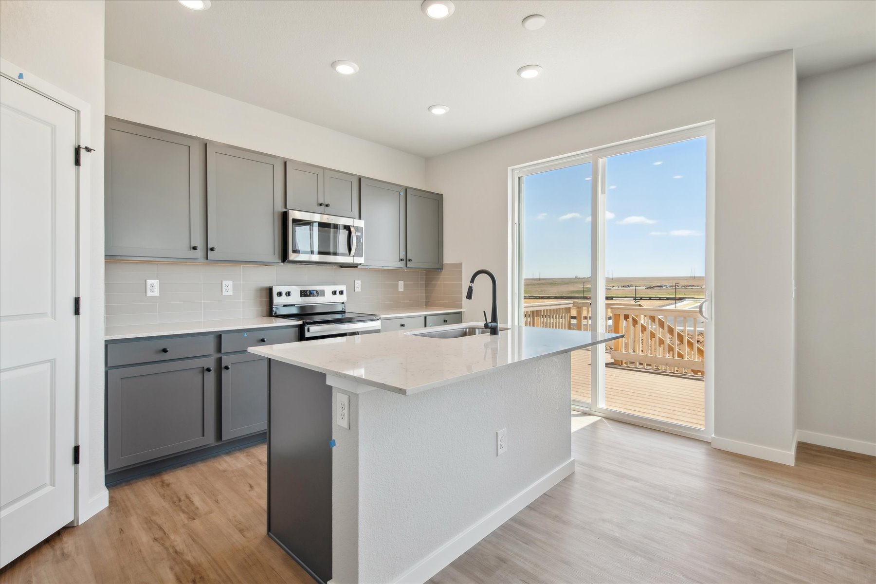A kitchen with a large island.