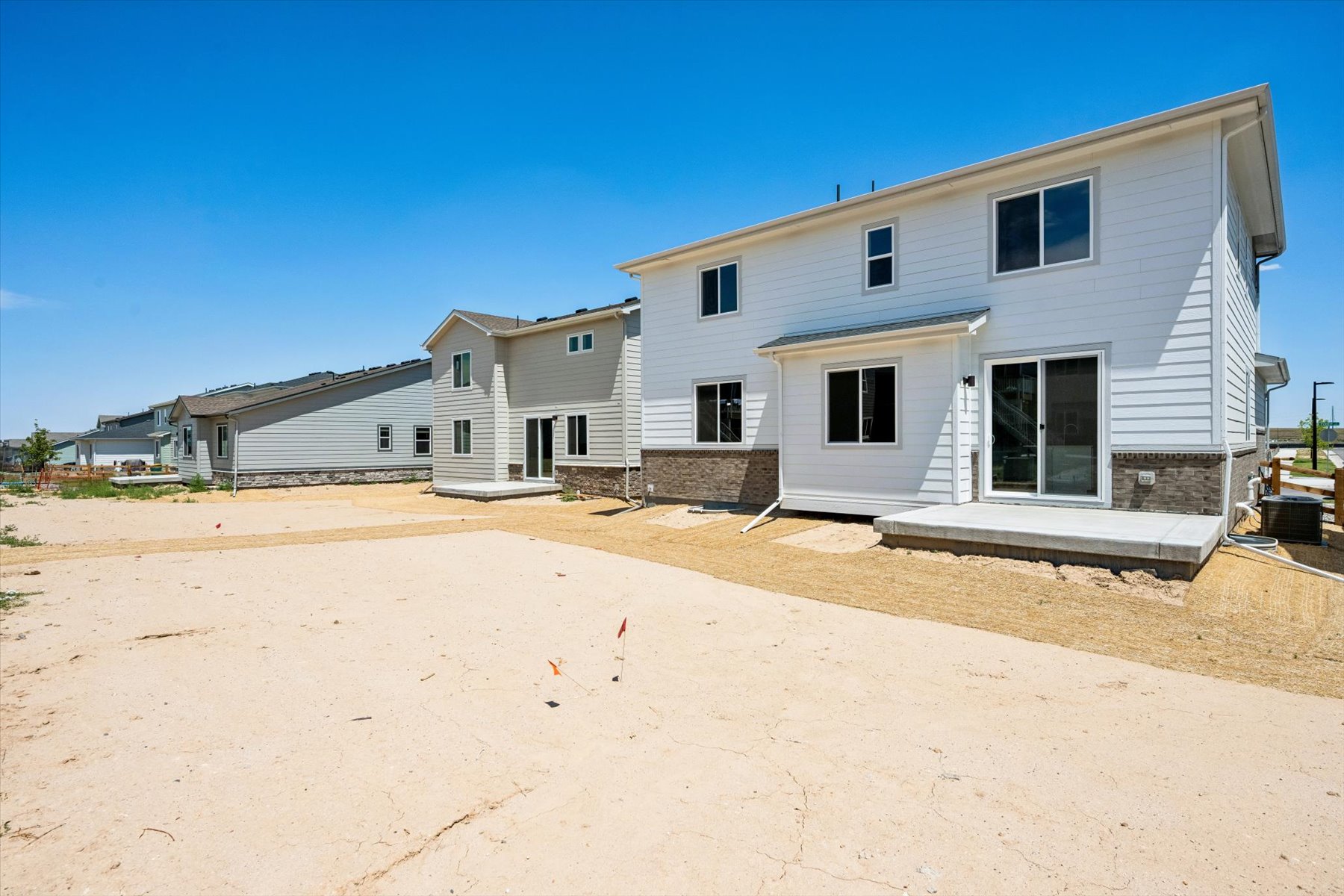 A house with a sandy beach.