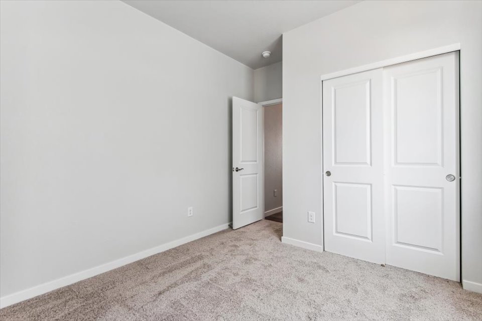 A room with white doors.