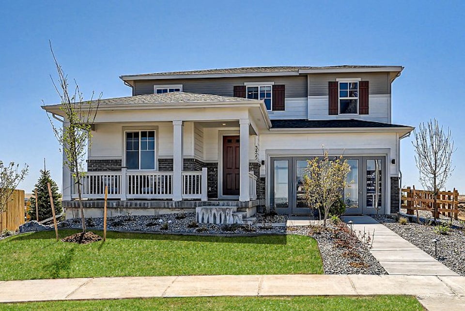 A house with a large front yard.