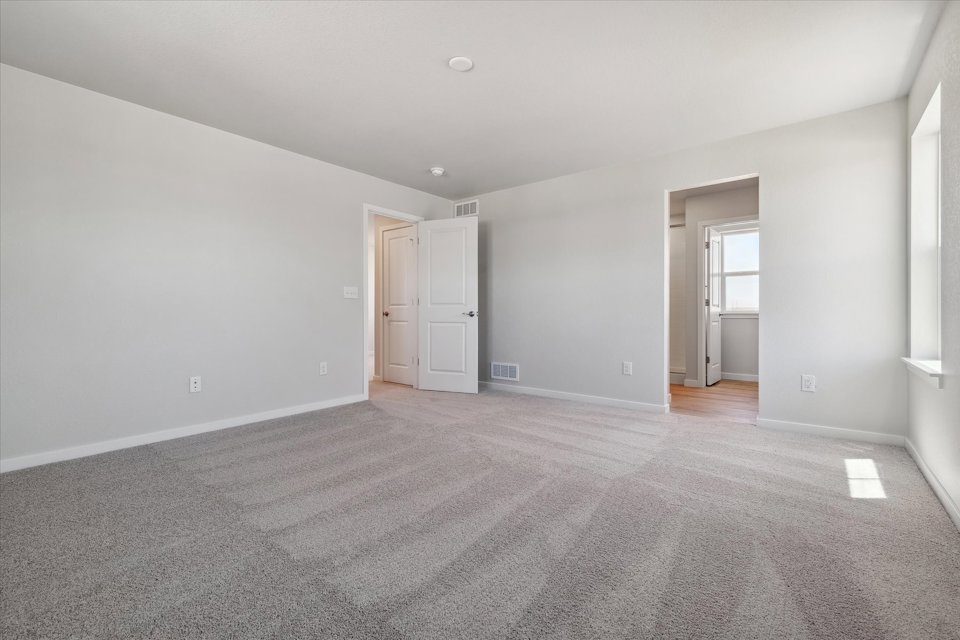 A room with white doors.