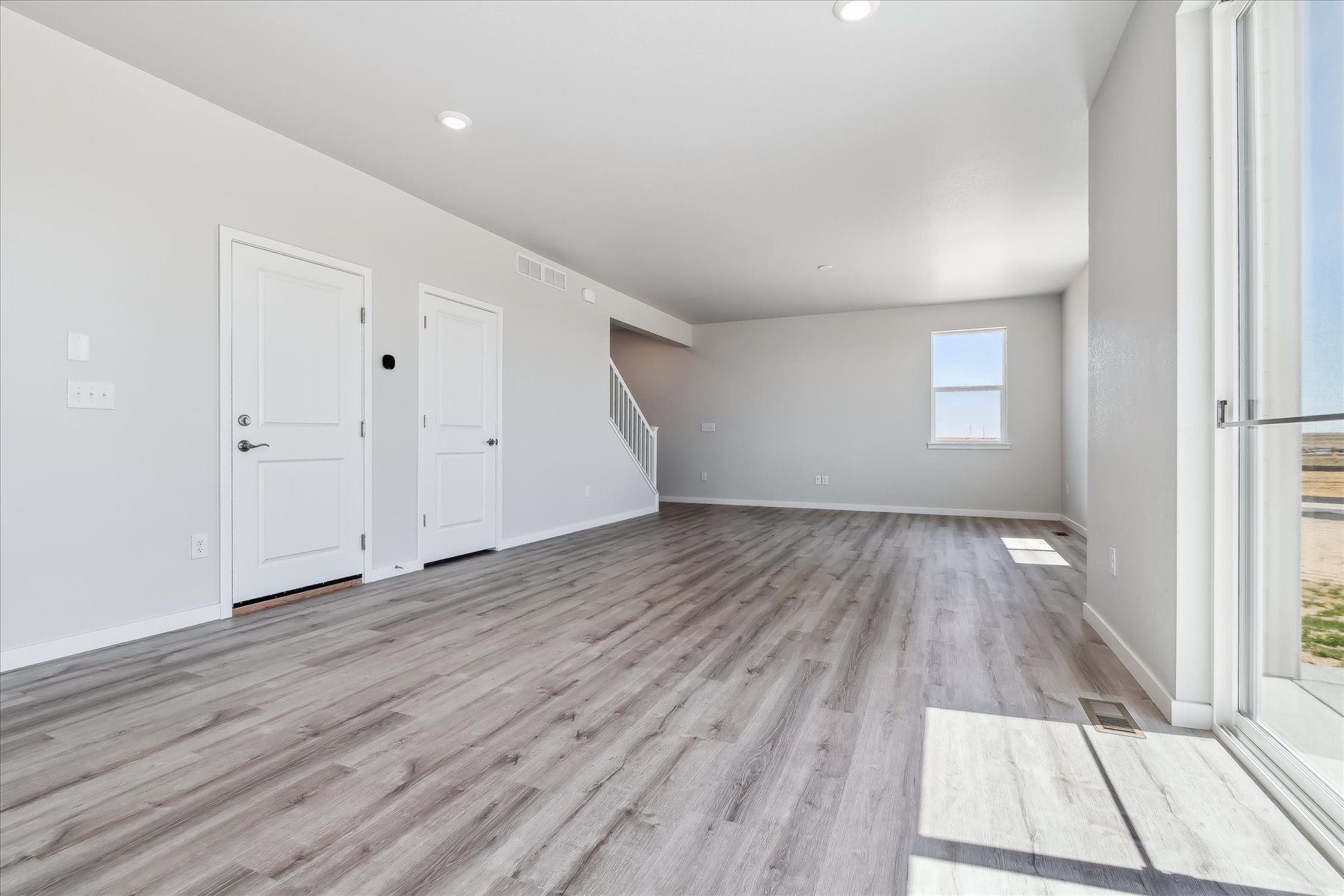 A room with white doors.
