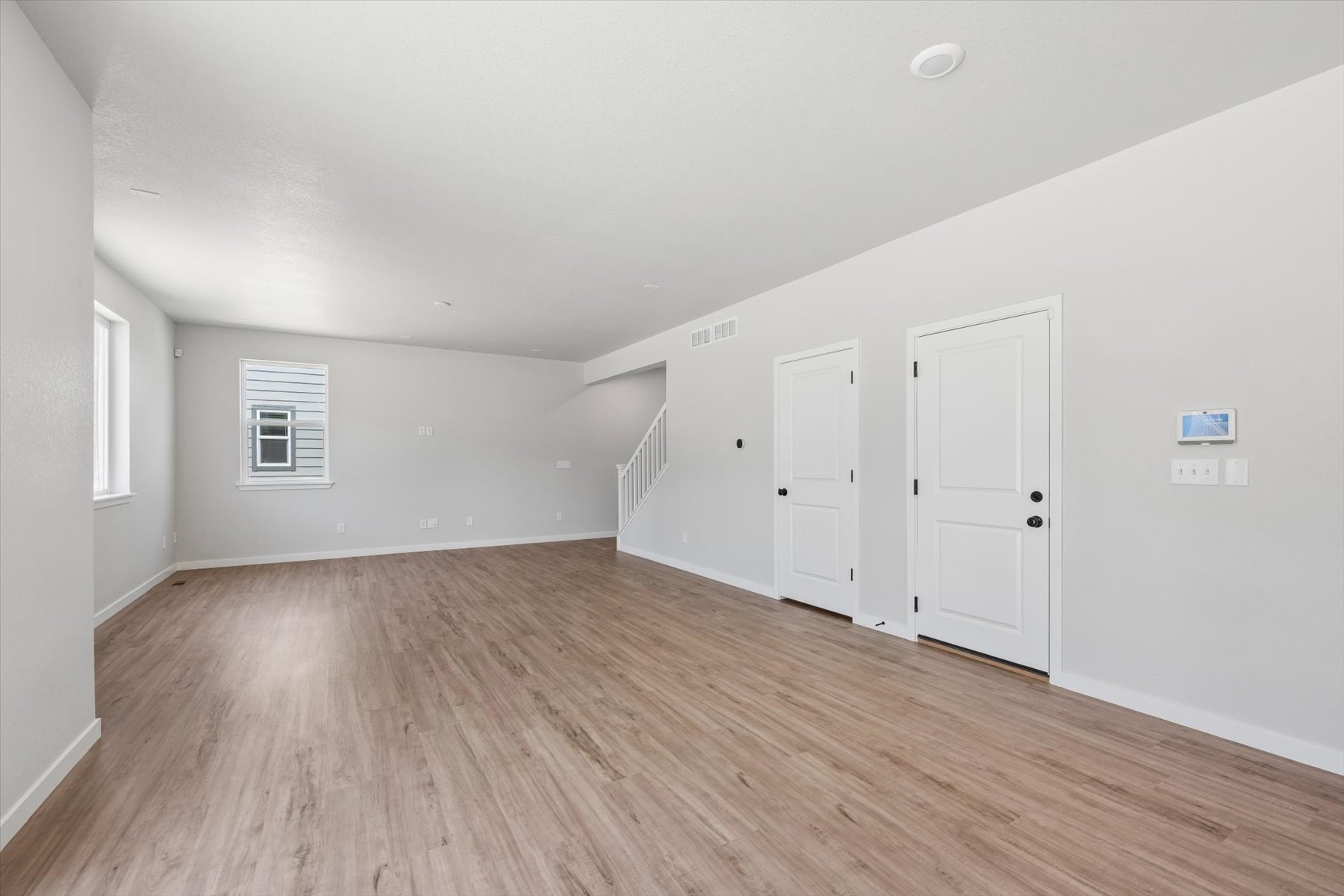A room with white doors.