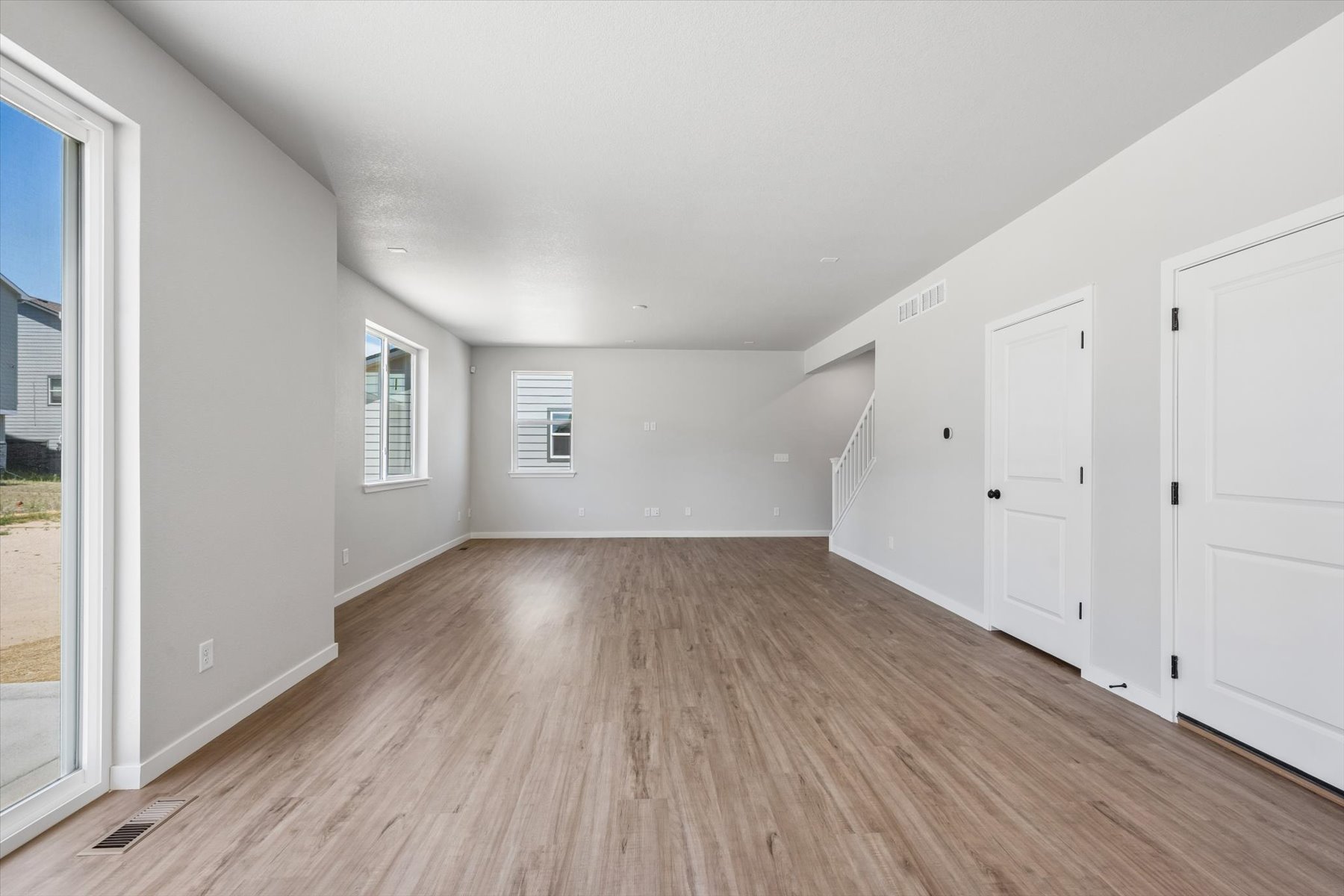 A room with white doors.