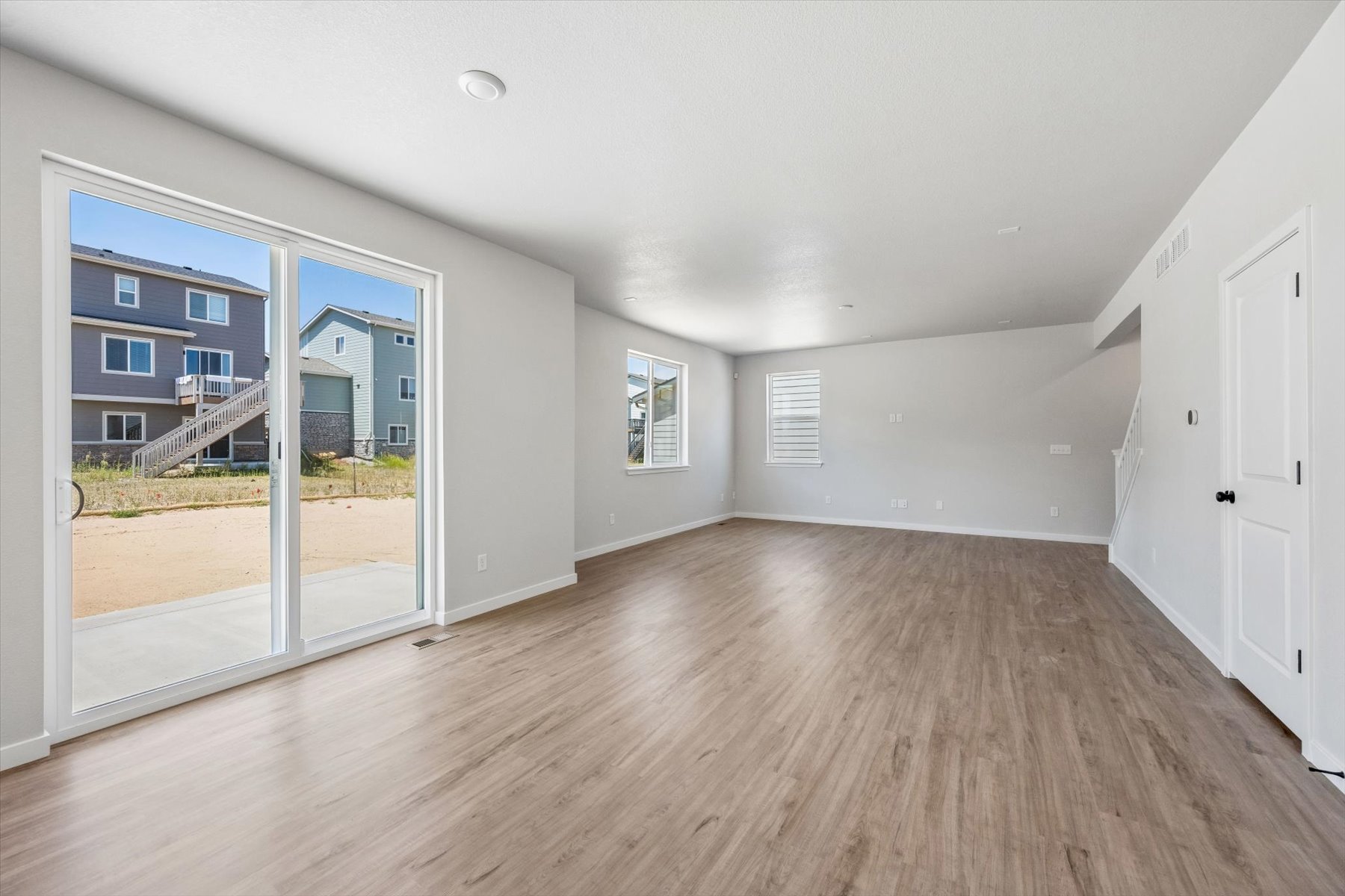 A room with a wood floor and a wood floor.
