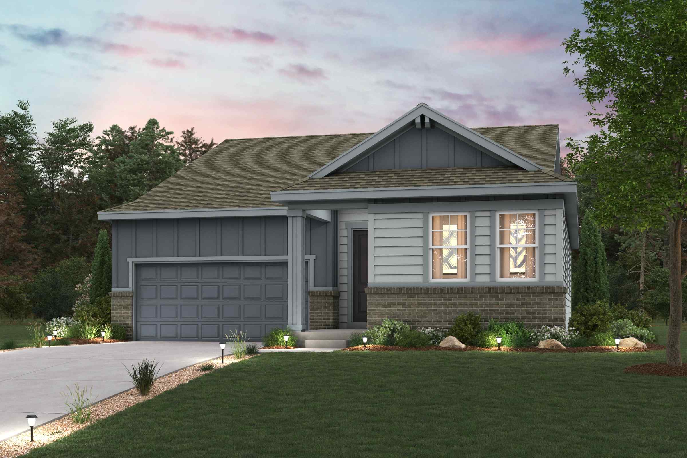 A house with a lawn in front of it.