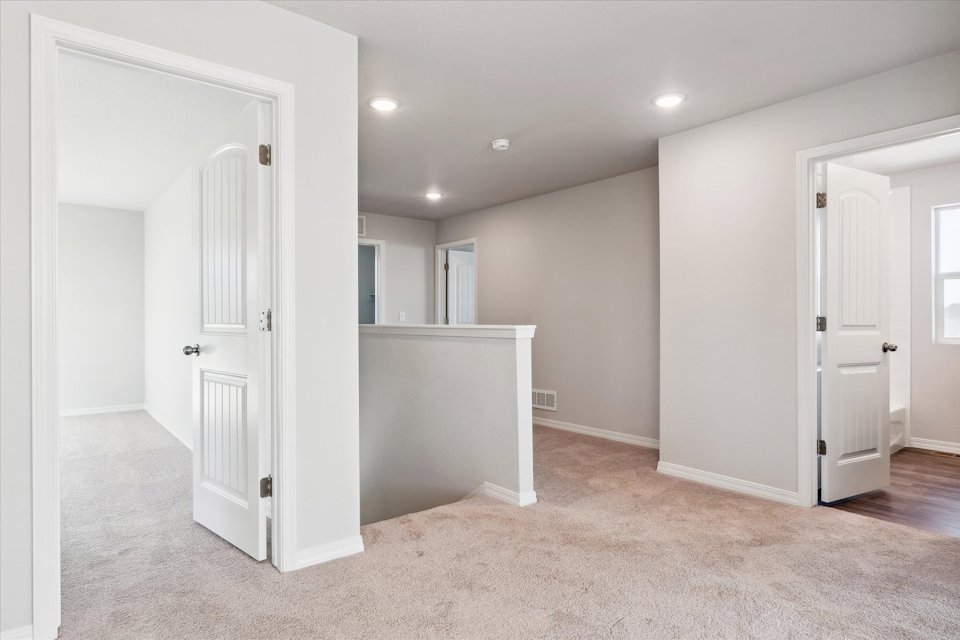 A room with white doors.