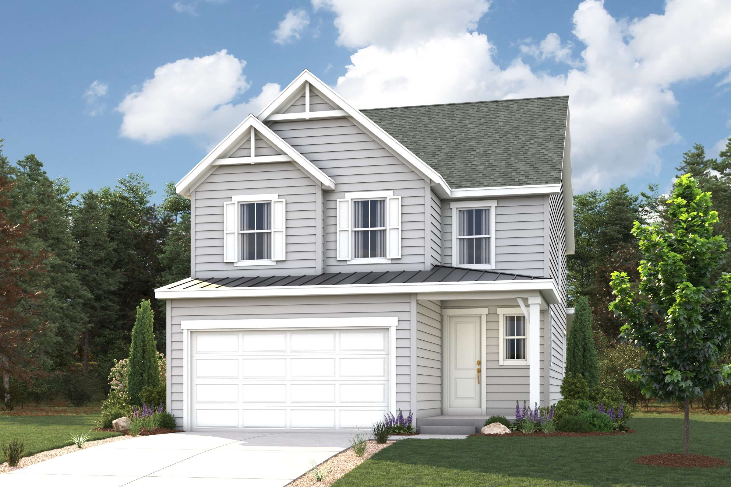 A white house with a garage.