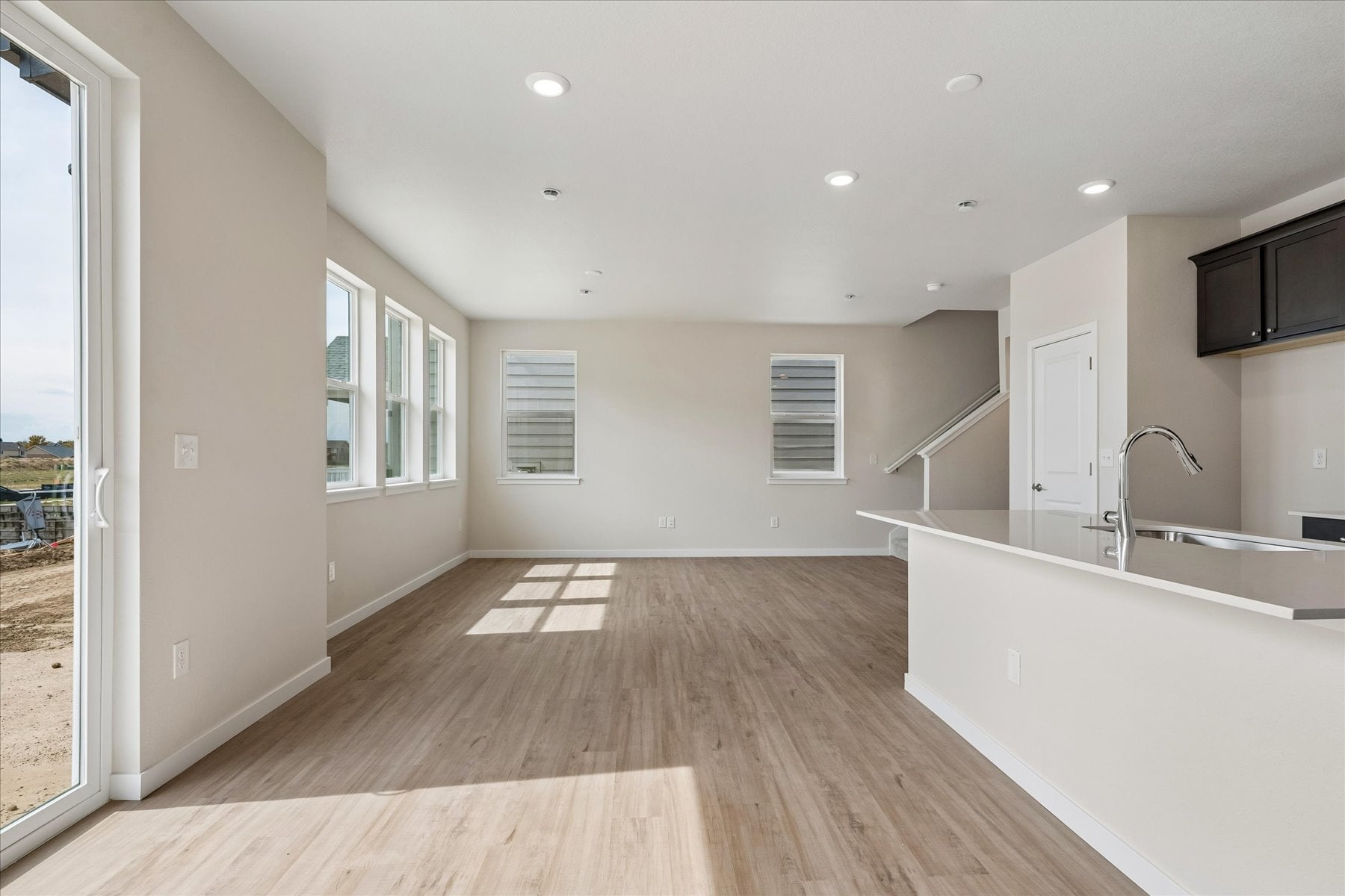 A bathroom with a wood floor.