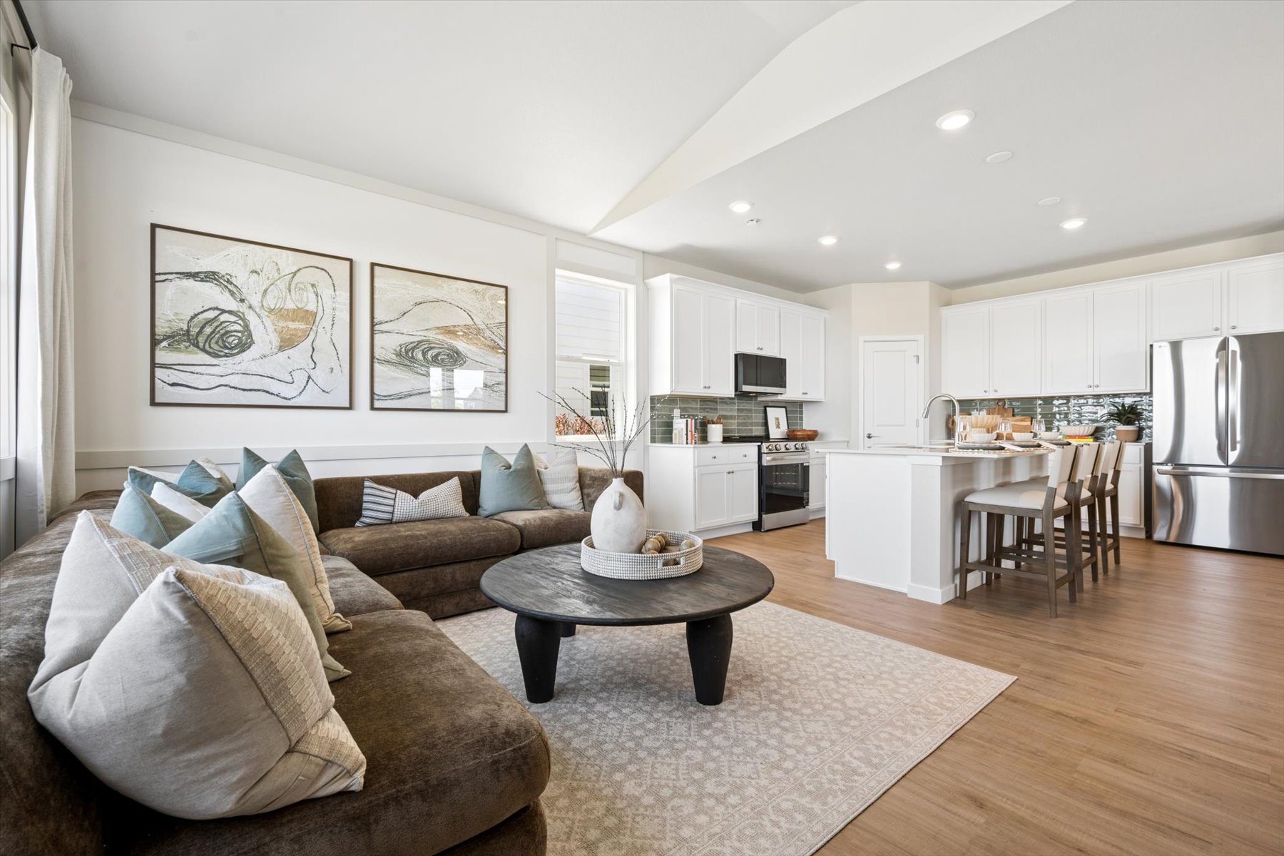 A living room with a couch and a table.