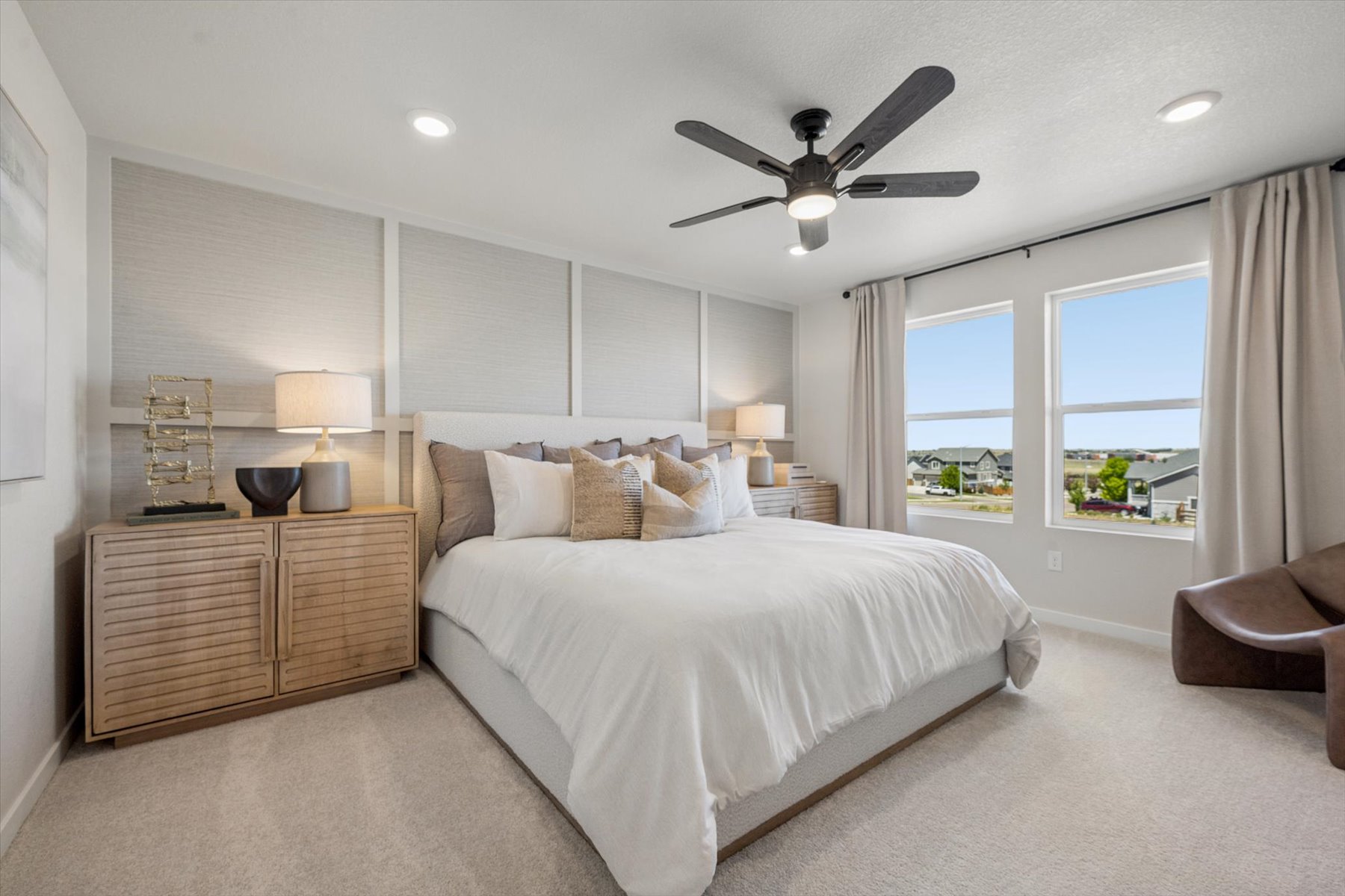 A bedroom with a large bed.