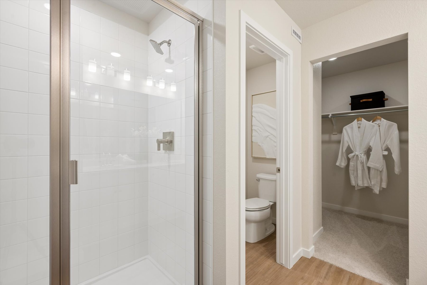A bathroom with a glass shower.