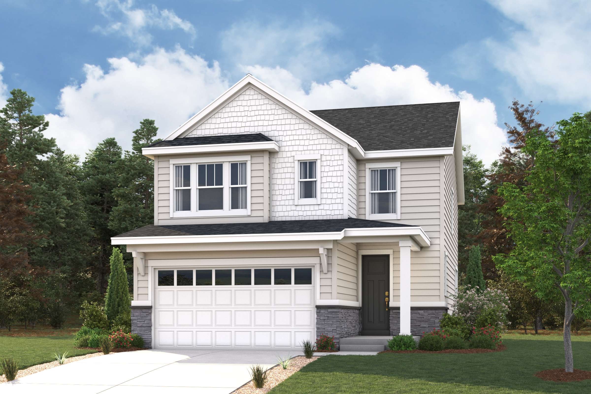 A white house with a driveway.