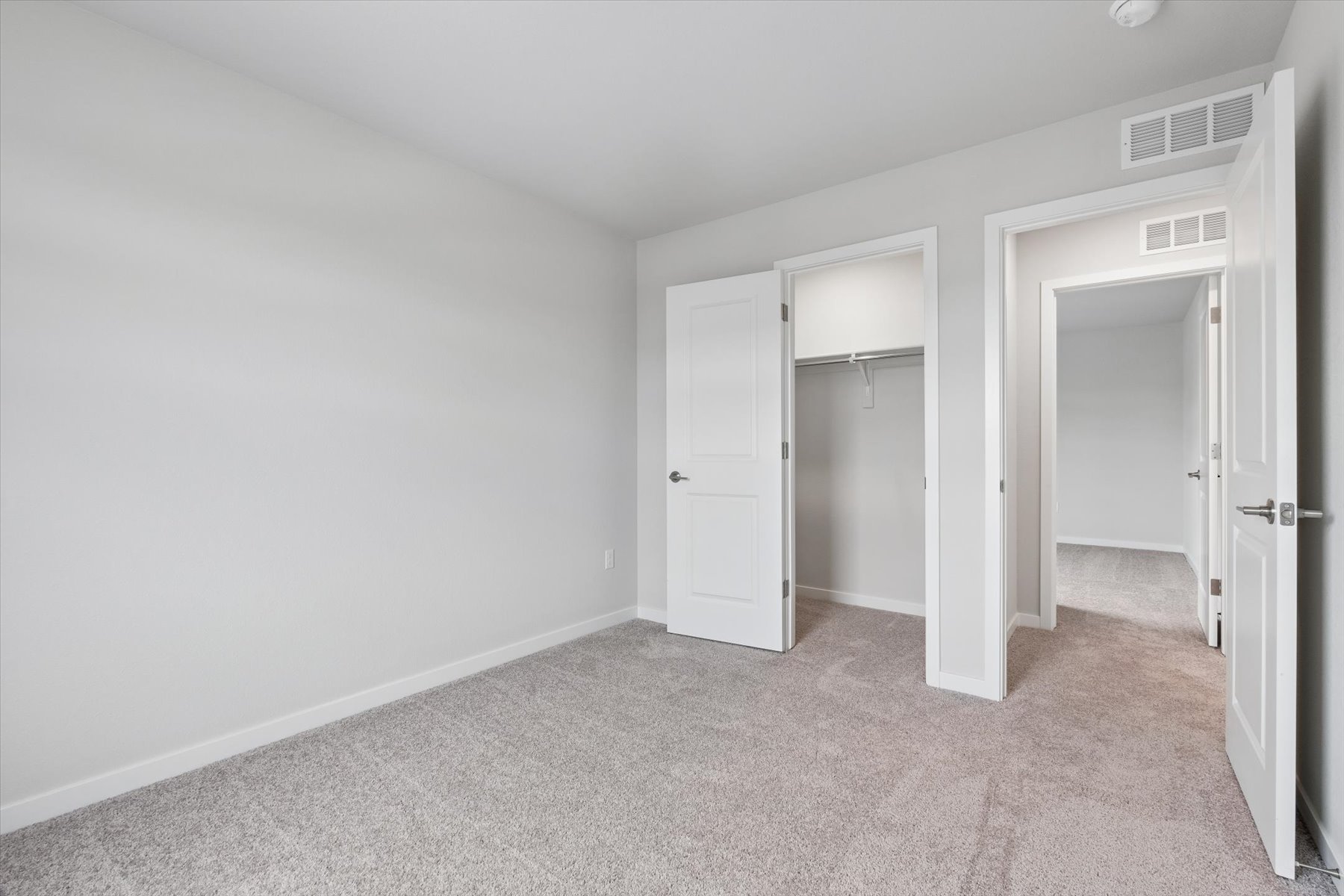 A room with white doors.