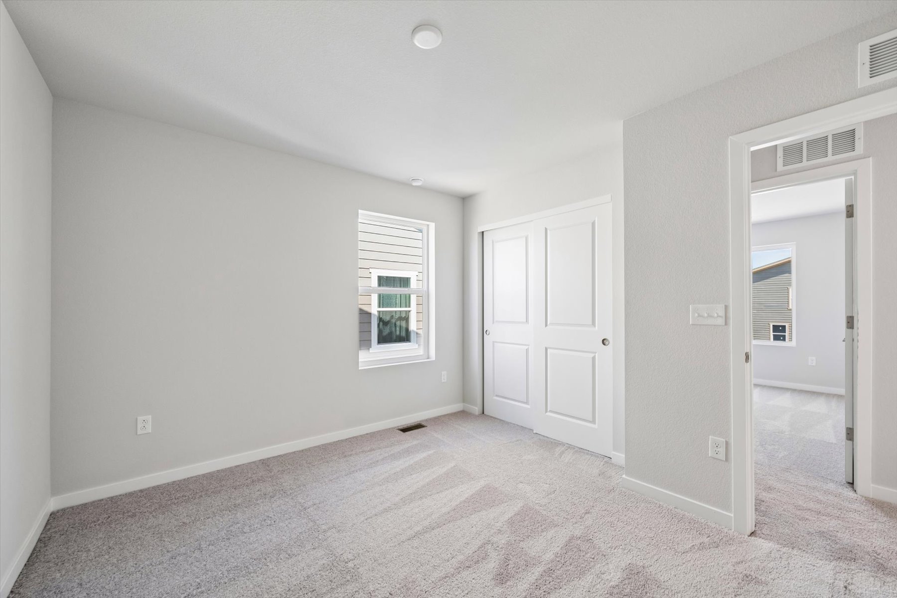 A room with white doors.