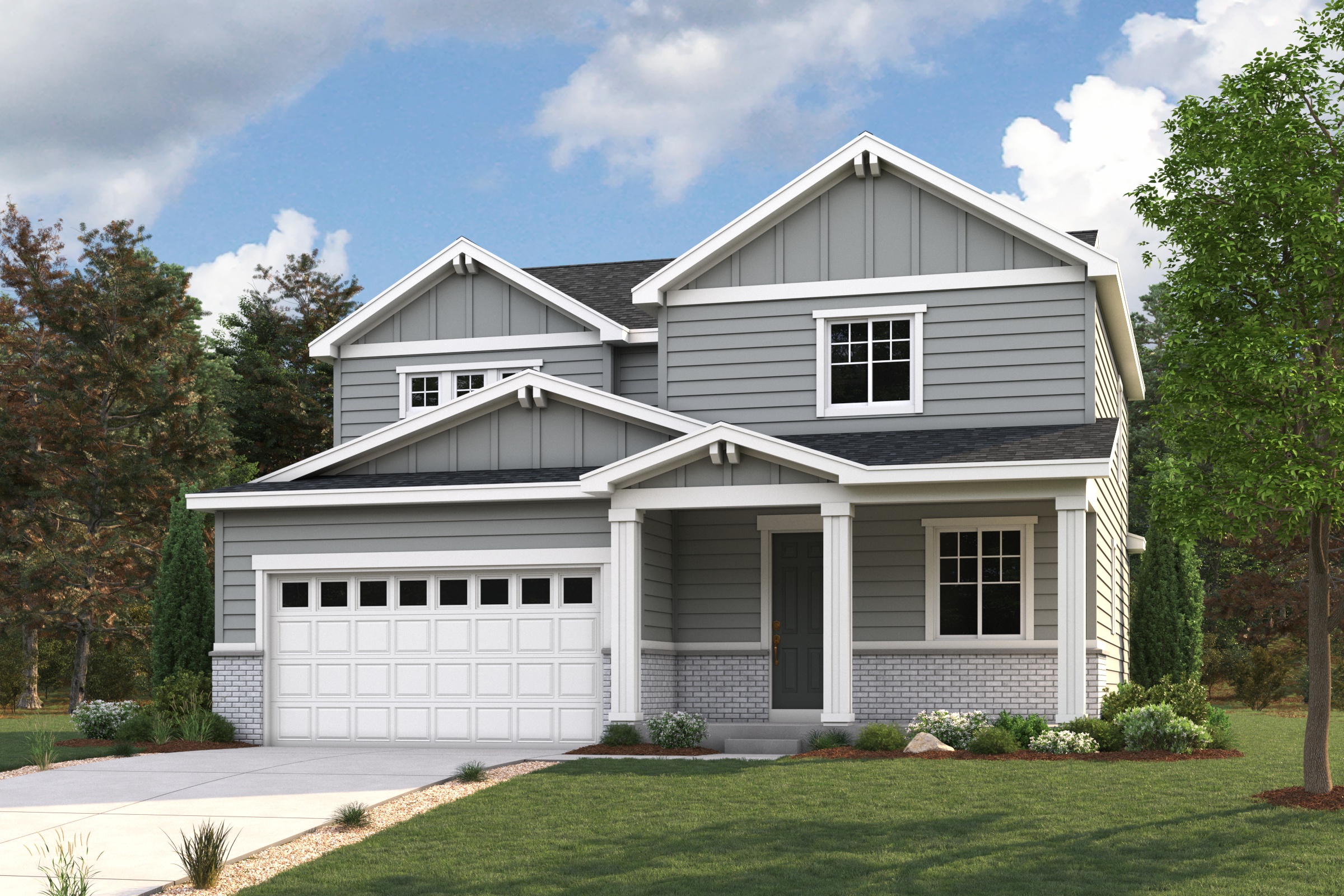 A white house with a garage.