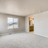 Second floor primary suite of the two-story Lewis plan by Century Communities