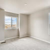 Secondary bedroom with natural light in the two-story Lewis plan by Century Communities