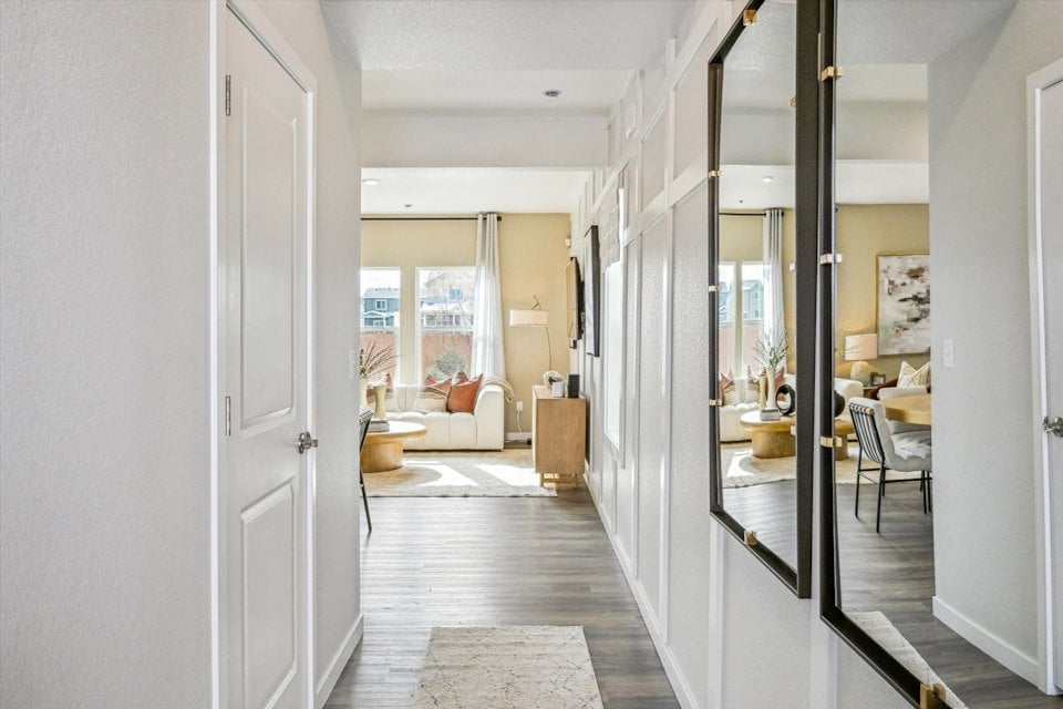 A hallway with glass doors.