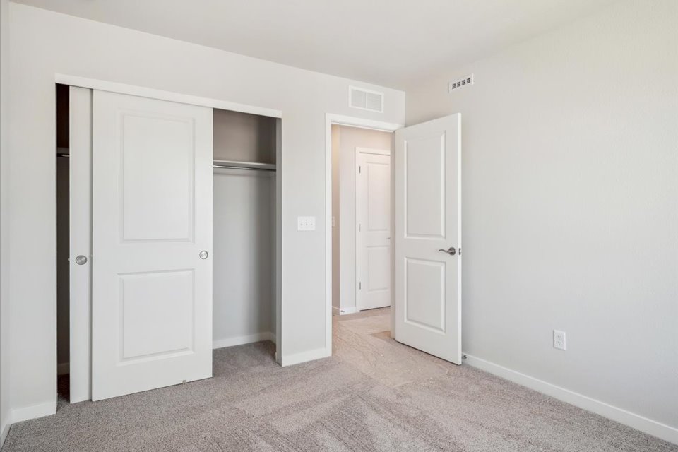 A room with white doors.