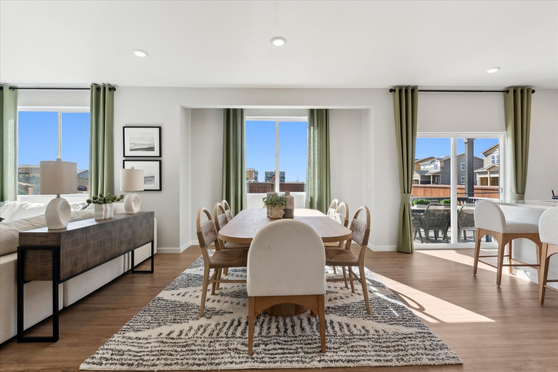 A room with a table and chairs.