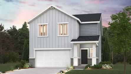 A house with a driveway and trees.